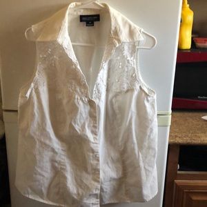 White sleeveless button up top